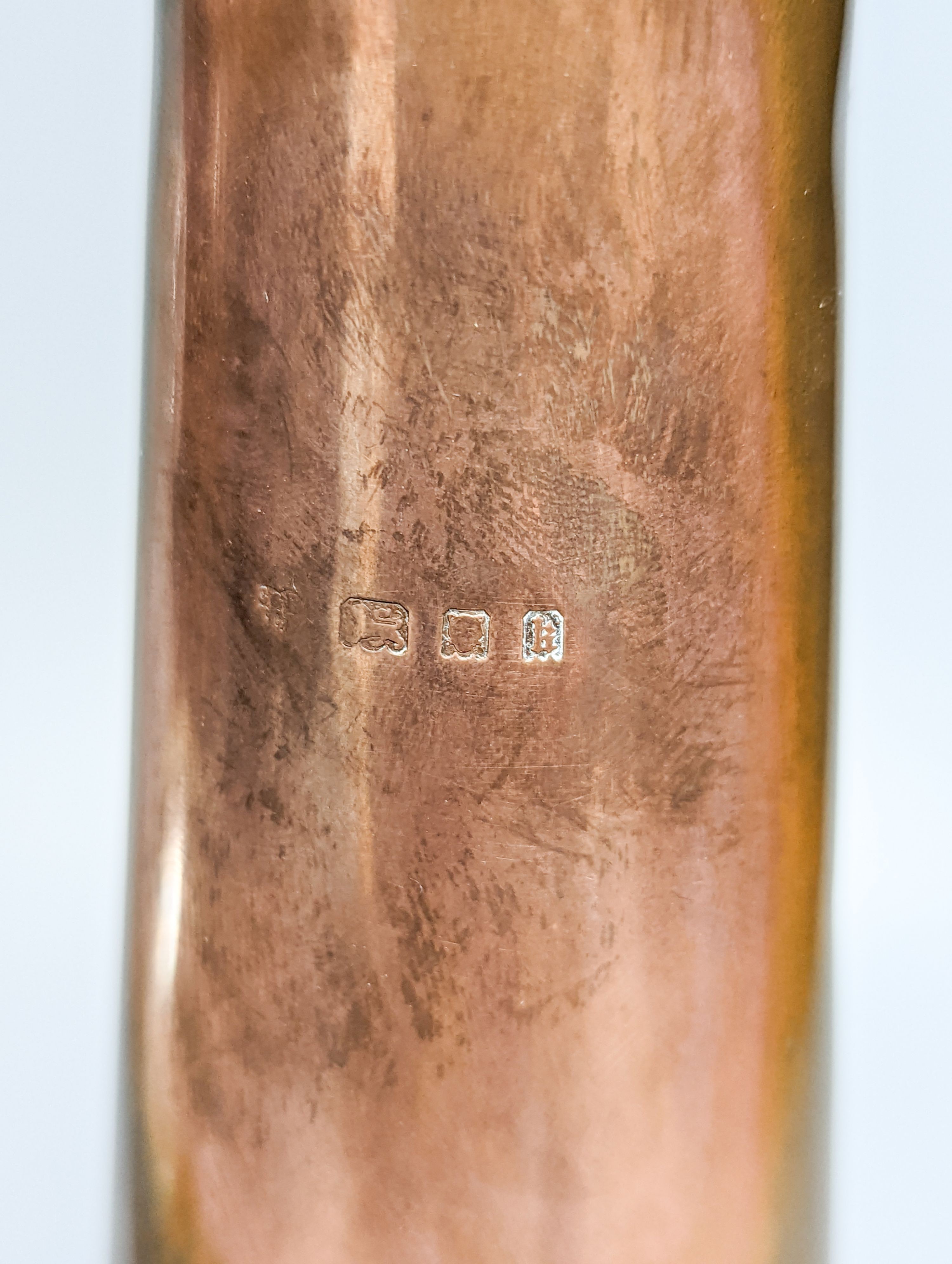 A copper plated silver base by Charles and Richard Comyns, London 1924, a large silver-mounted wine cooler and a glass jug